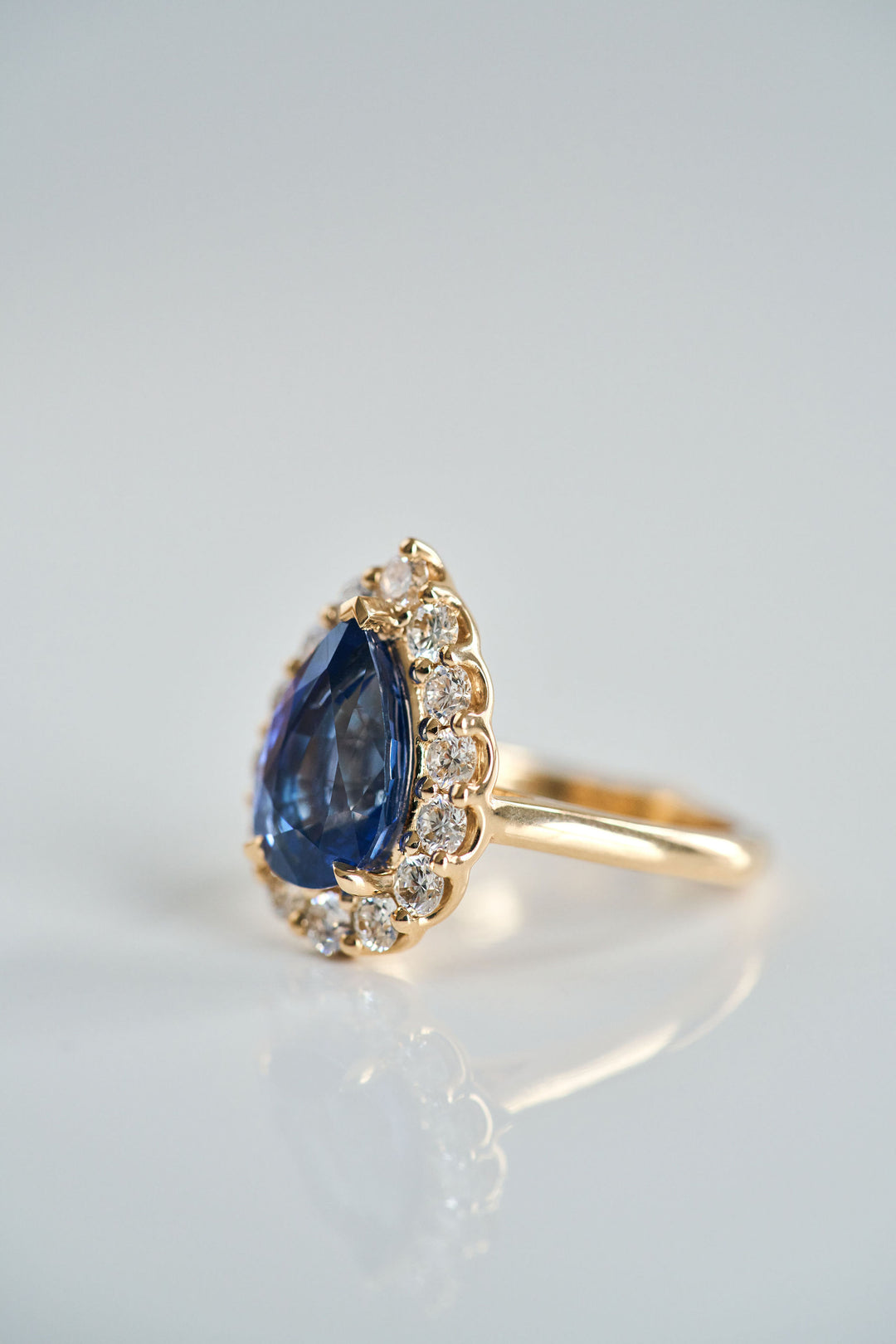 Pear Shape Blue Sapphire with Floral Halo