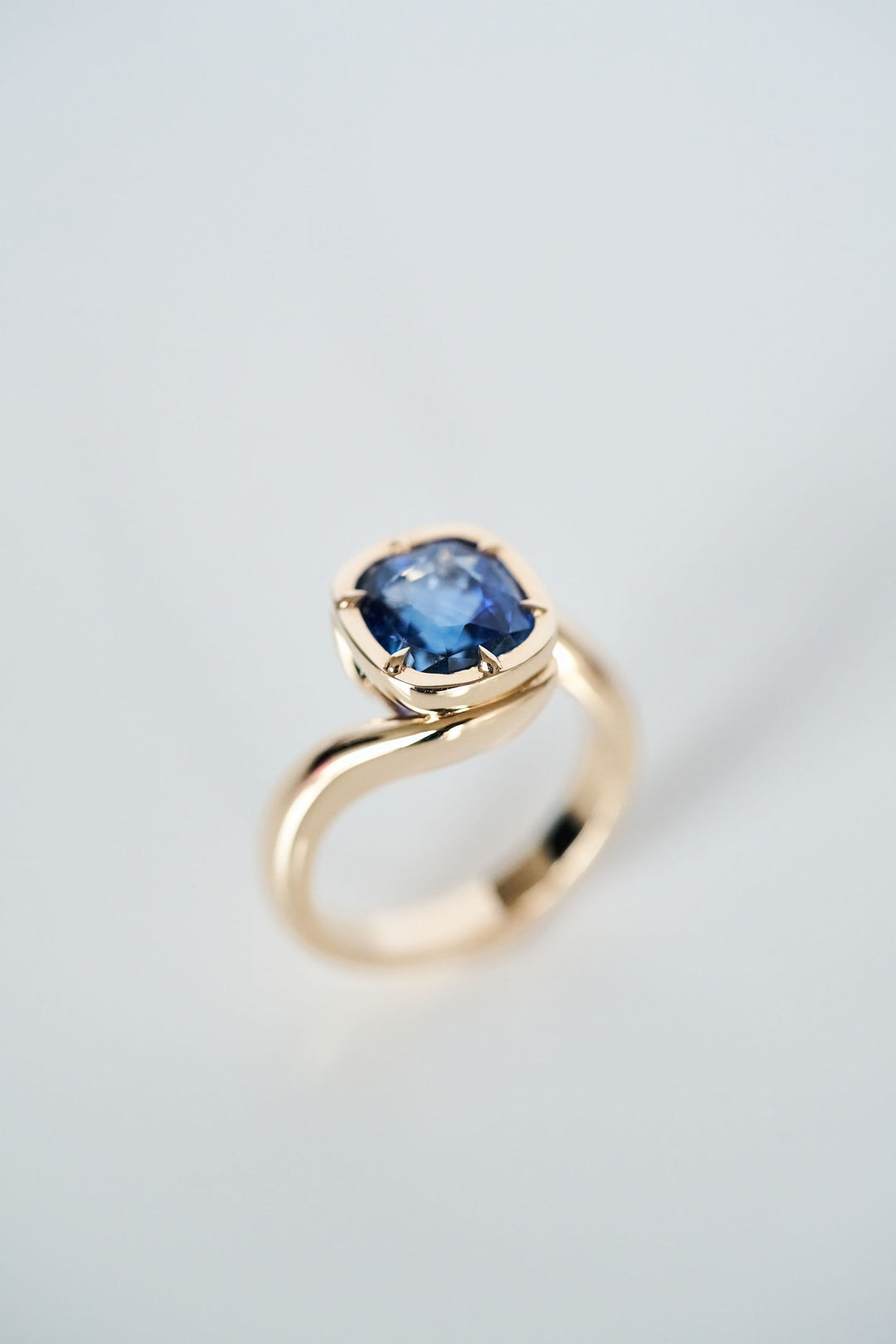 Cushion Cut Blue Sapphire Bypass Canopy Ring