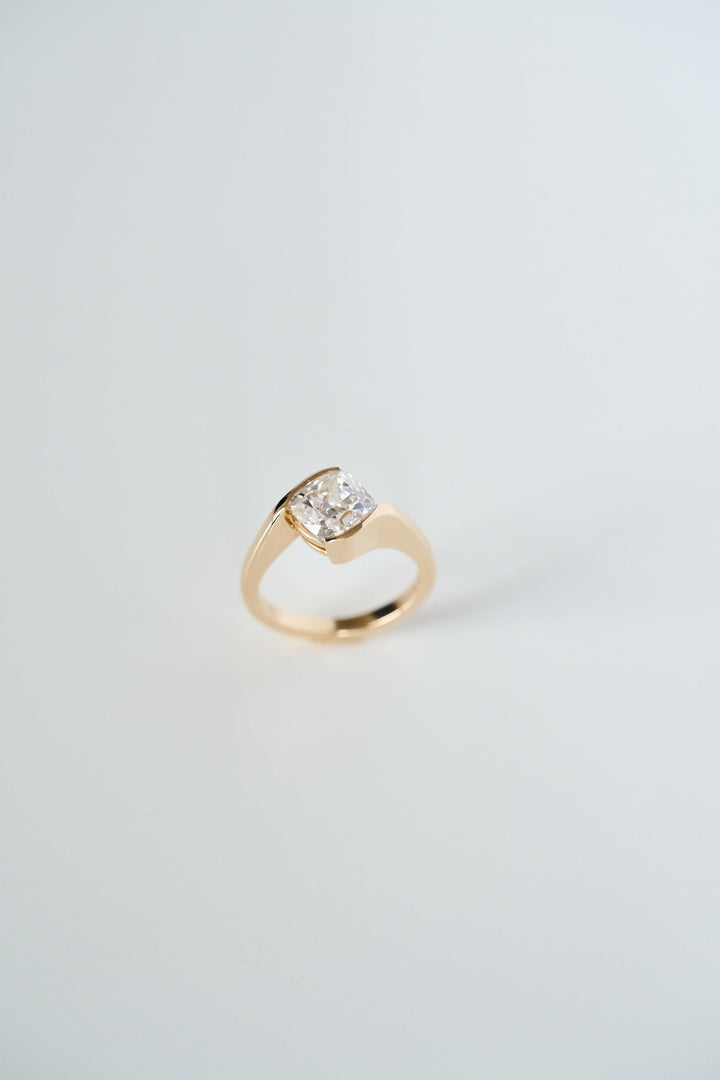 Cushion Cut Half Bezel Diamond Bypass Ring