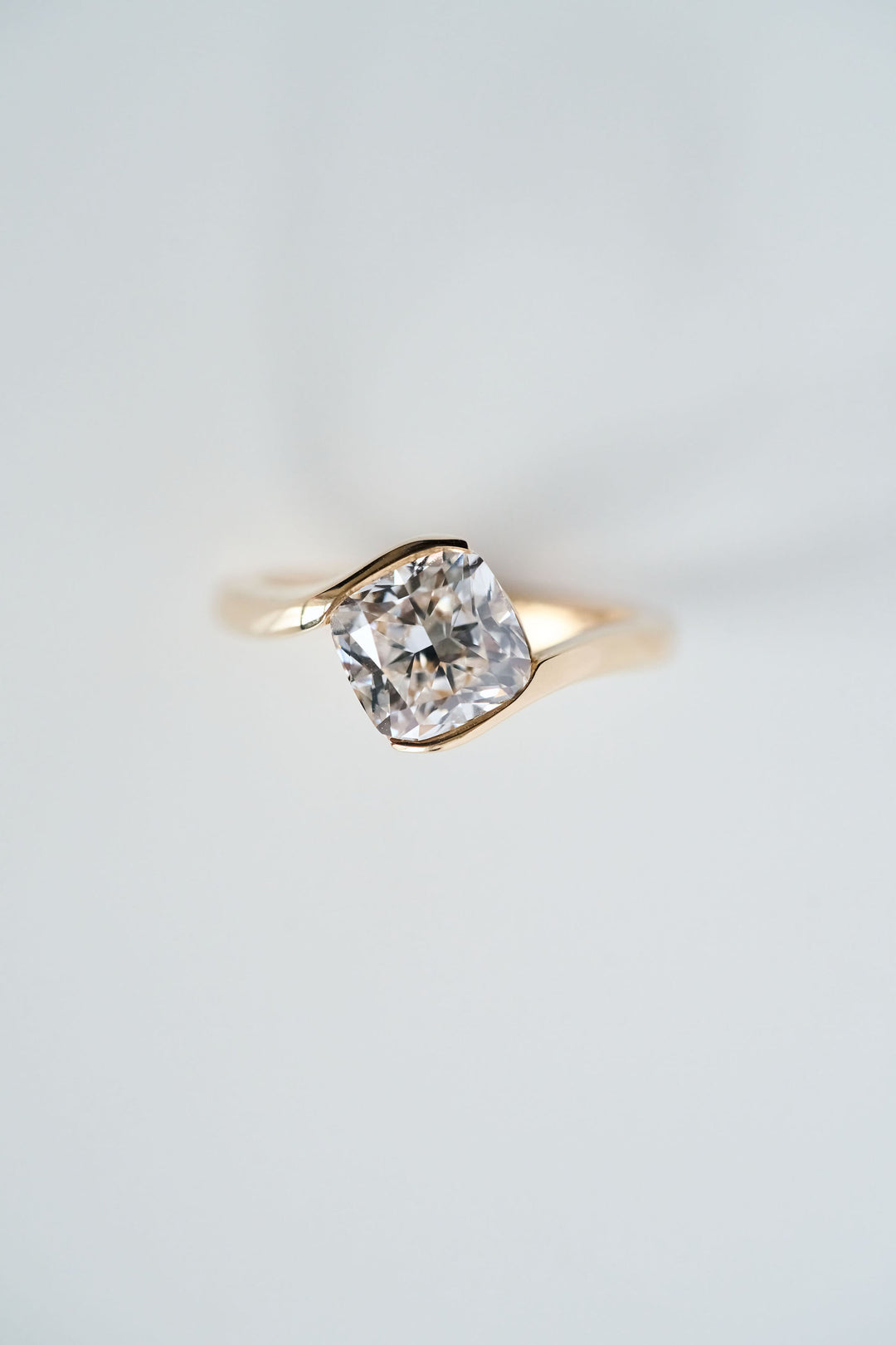 Cushion Cut Half Bezel Diamond Bypass Ring