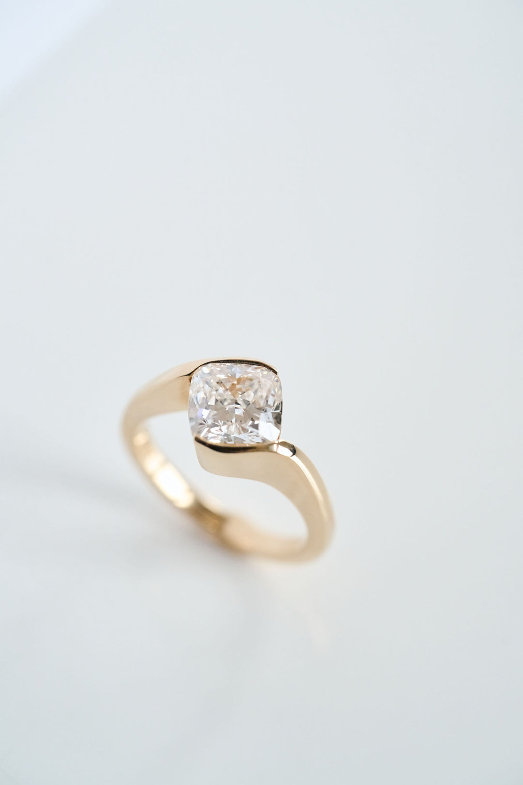 Cushion Cut Half Bezel Diamond Bypass Ring