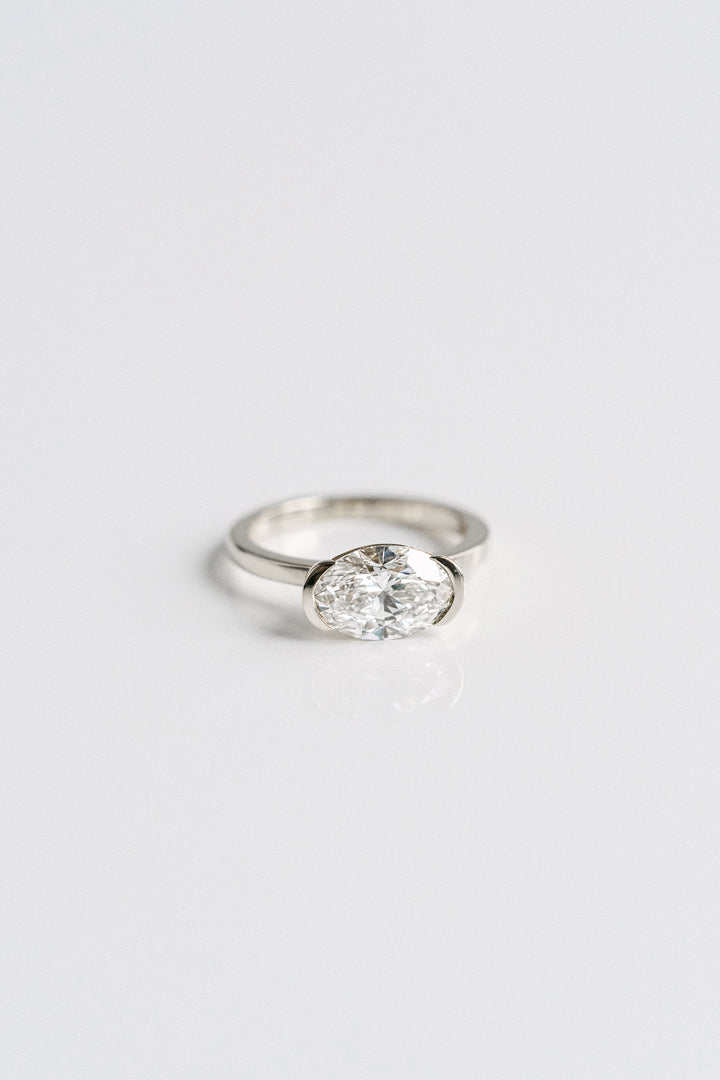 Oval Diamond East-West Half Bezel