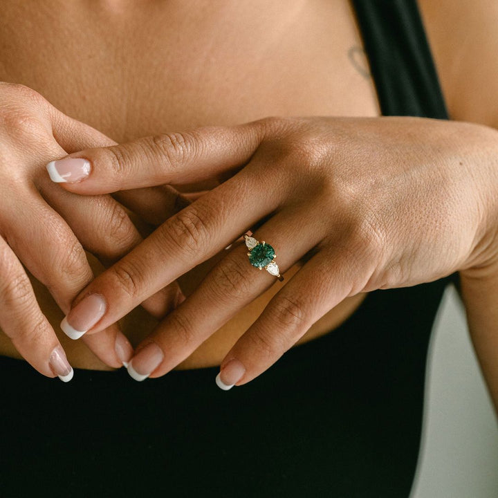 Oval Blue-Green Sapphire With Pear Shape Diamond Accents