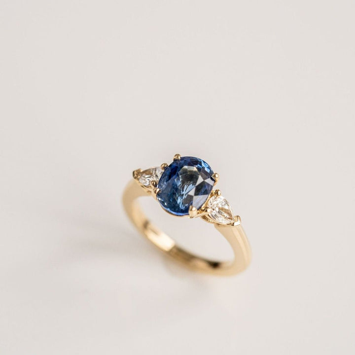 Oval Blue Sapphire With Pear Shape Diamond Accents
