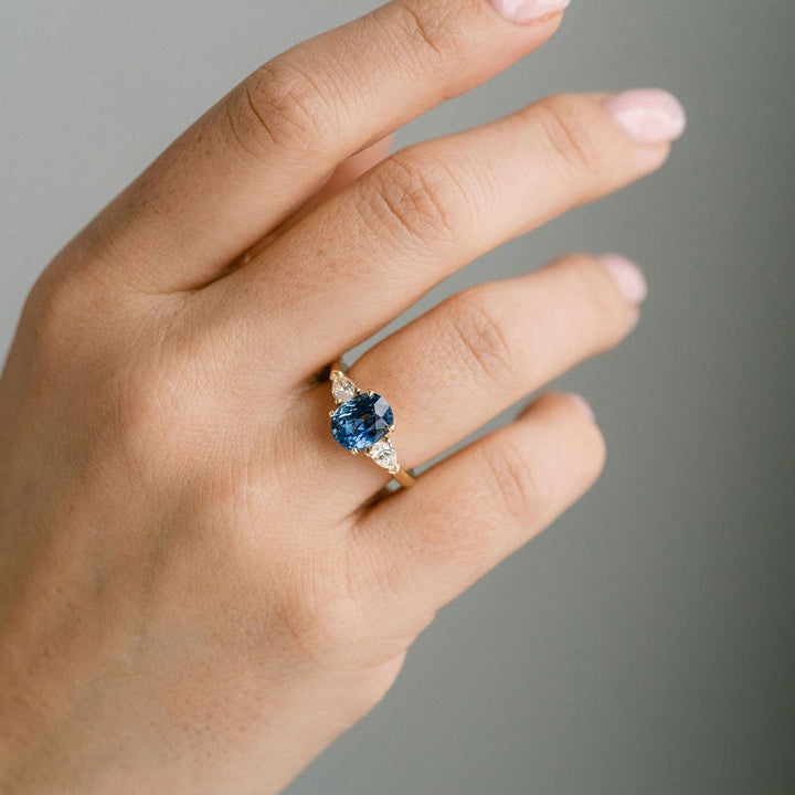 Oval Blue Sapphire With Pear Shape Diamond Accents