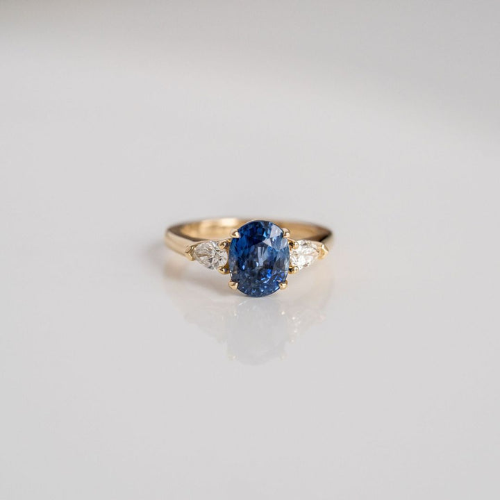 Oval Blue Sapphire With Pear Shape Diamond Accents
