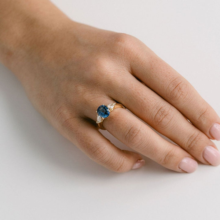Oval Blue Sapphire With Pear Shape Diamond Accents