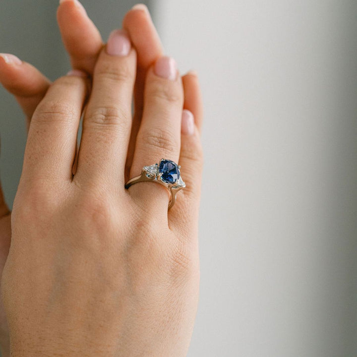 Oval Blue Sapphire With Shield Shape Diamond Accents