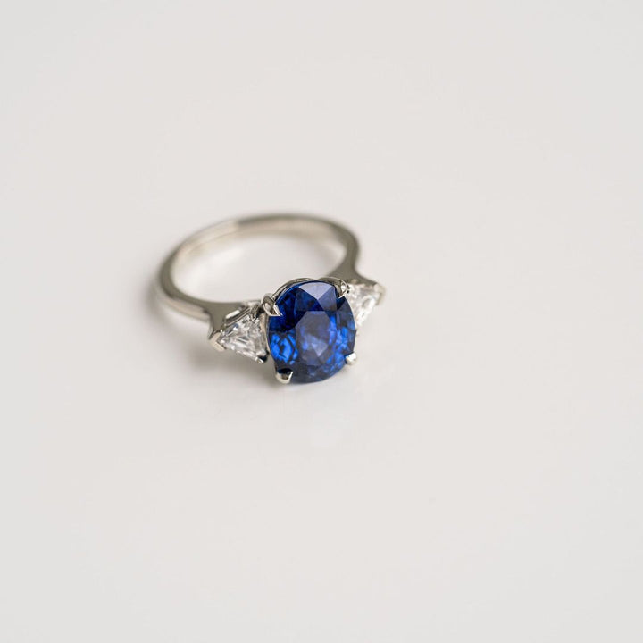 Oval Blue Sapphire With Shield Shape Diamond Accents