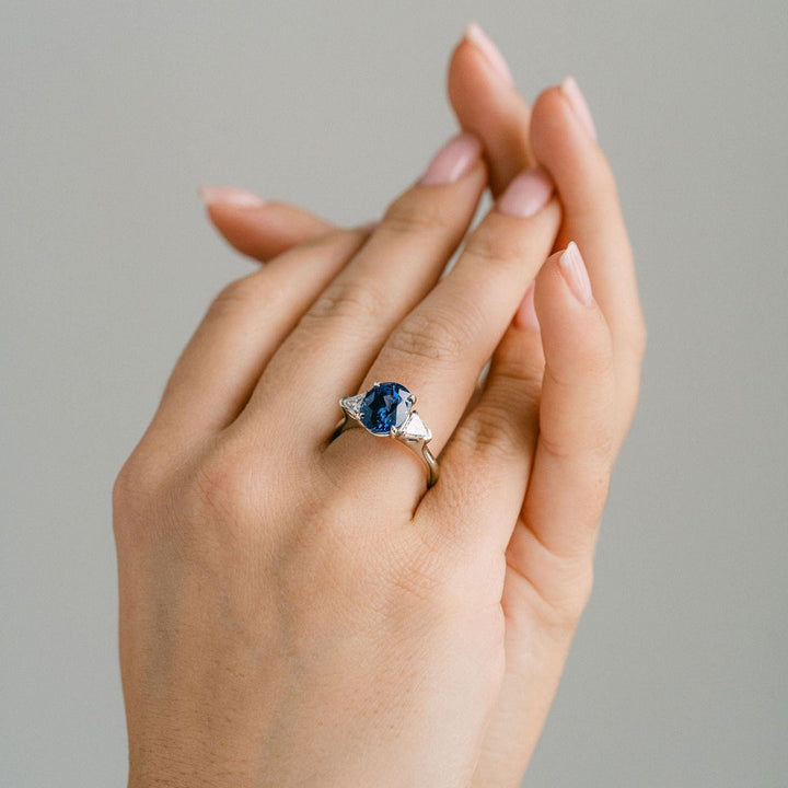 Oval Blue Sapphire With Shield Shape Diamond Accents