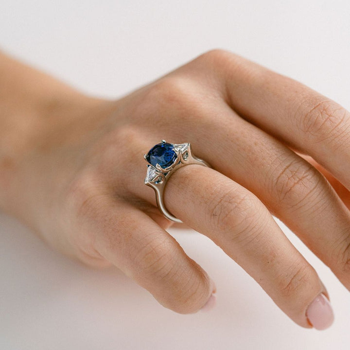 Oval Blue Sapphire With Shield Shape Diamond Accents