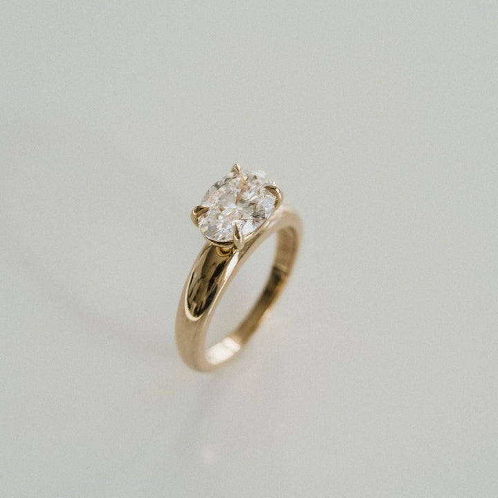 Oval Diamond East-West Arc Ring