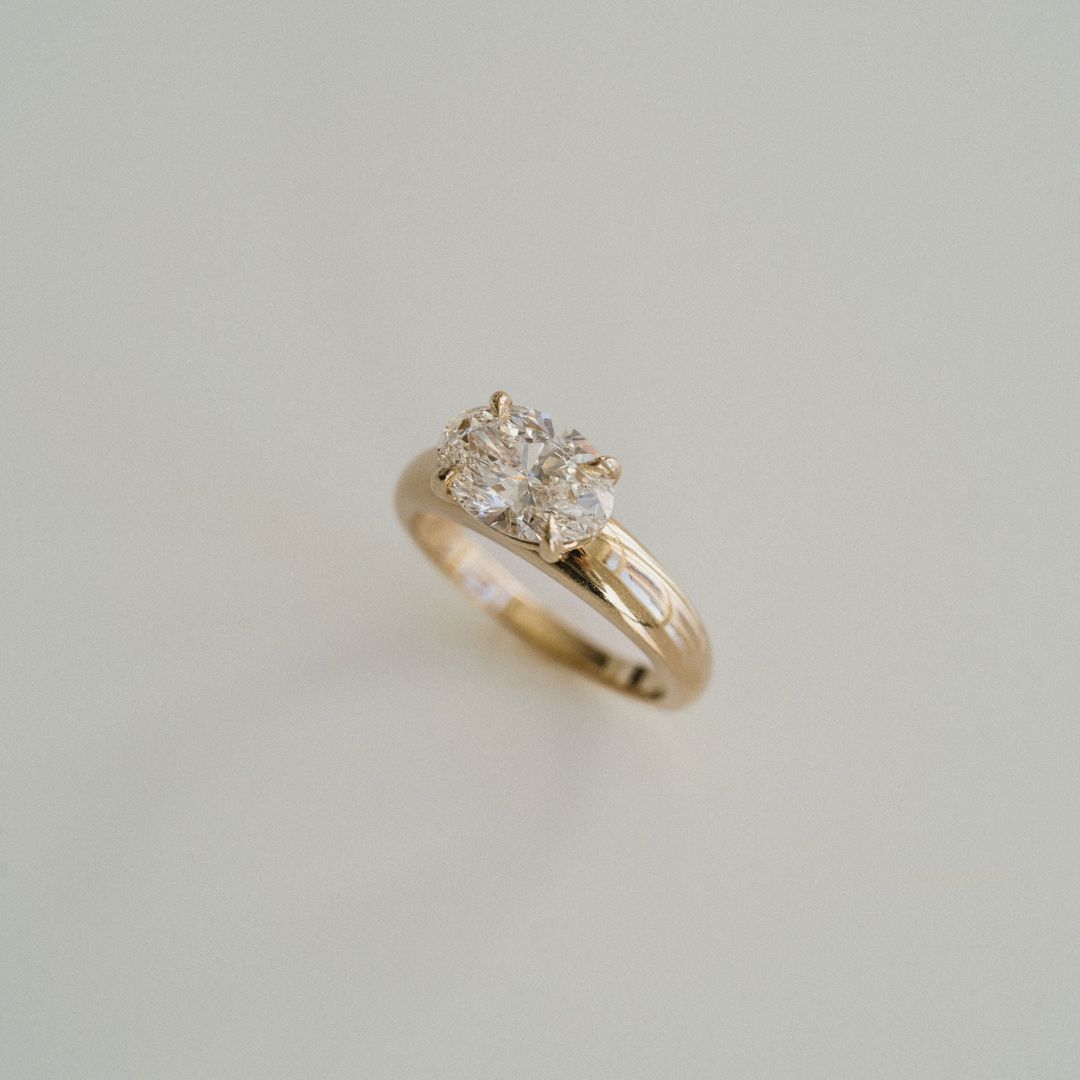 Oval Diamond East-West Arc Ring
