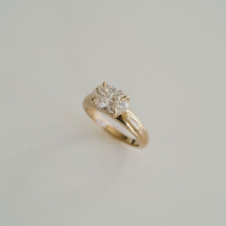 Oval Diamond East-West Arc Ring
