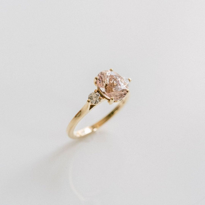 Oval Peach-Pink Sapphire With Round Diamond Accents