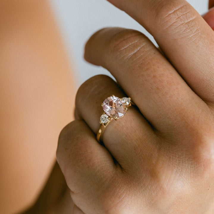 Oval Peach-Pink Sapphire With Round Diamond Accents