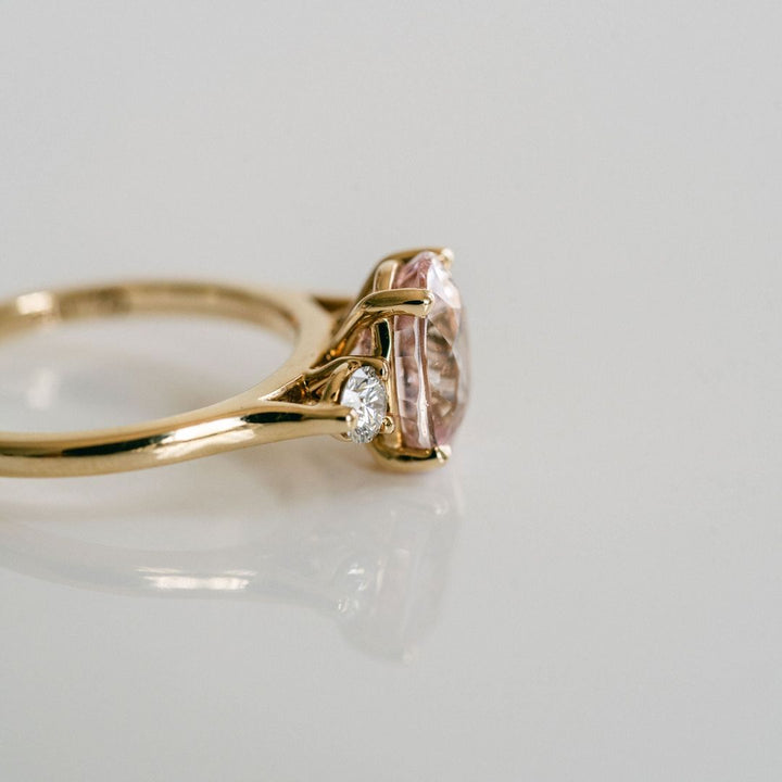 Oval Peach-Pink Sapphire With Round Diamond Accents