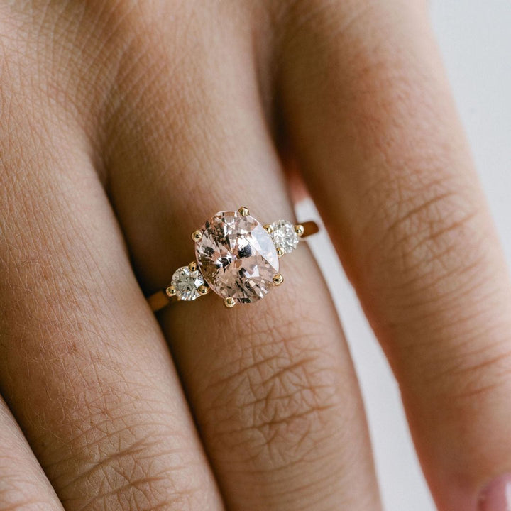 Oval Peach-Pink Sapphire With Round Diamond Accents