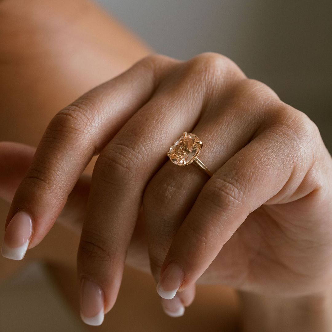 Oval Peach Sapphire Dominion With Diamond Collar