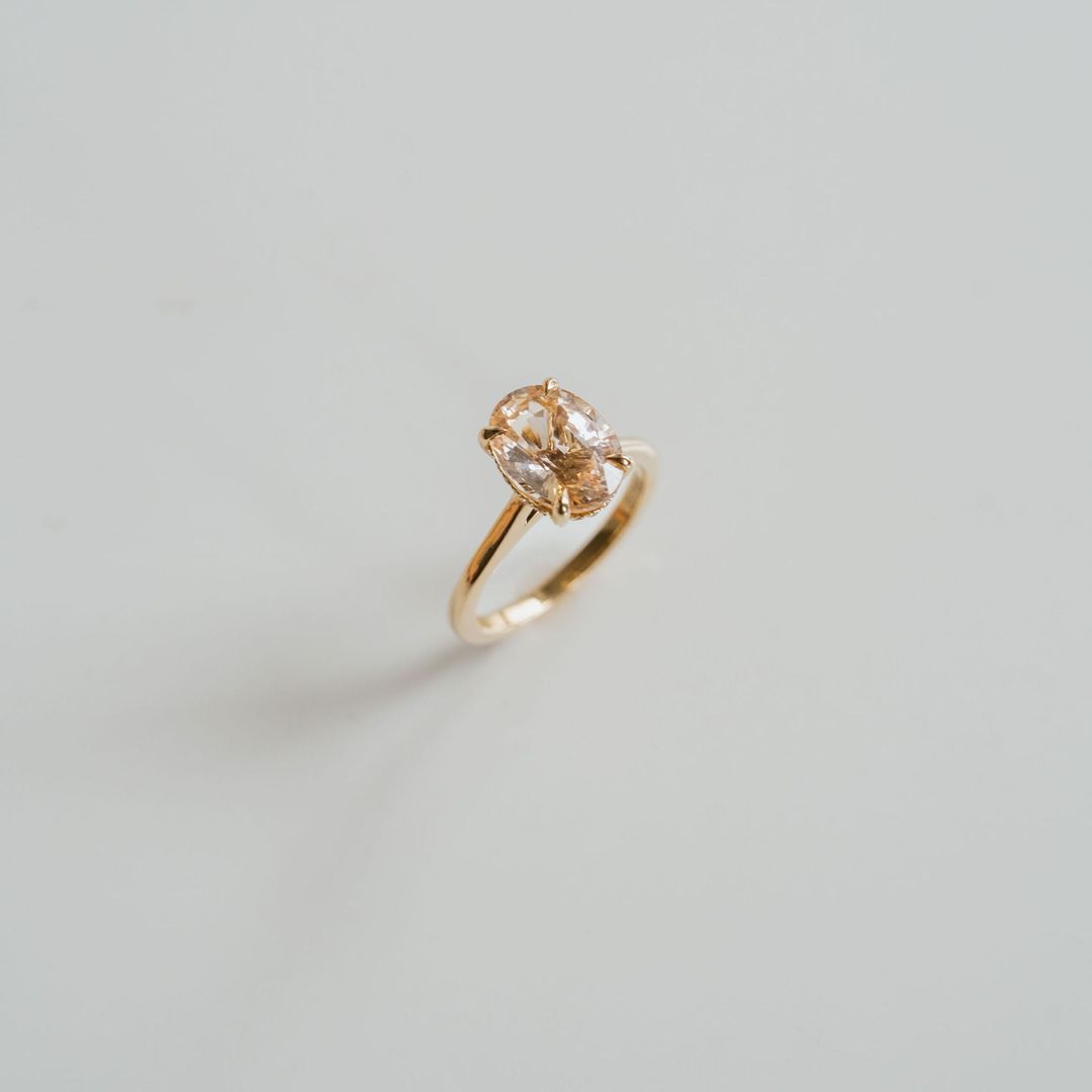 Oval Peach Sapphire Dominion With Diamond Collar