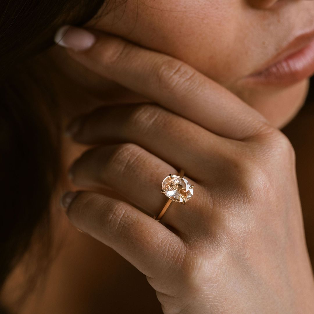 Oval Peach Sapphire Dominion With Diamond Collar