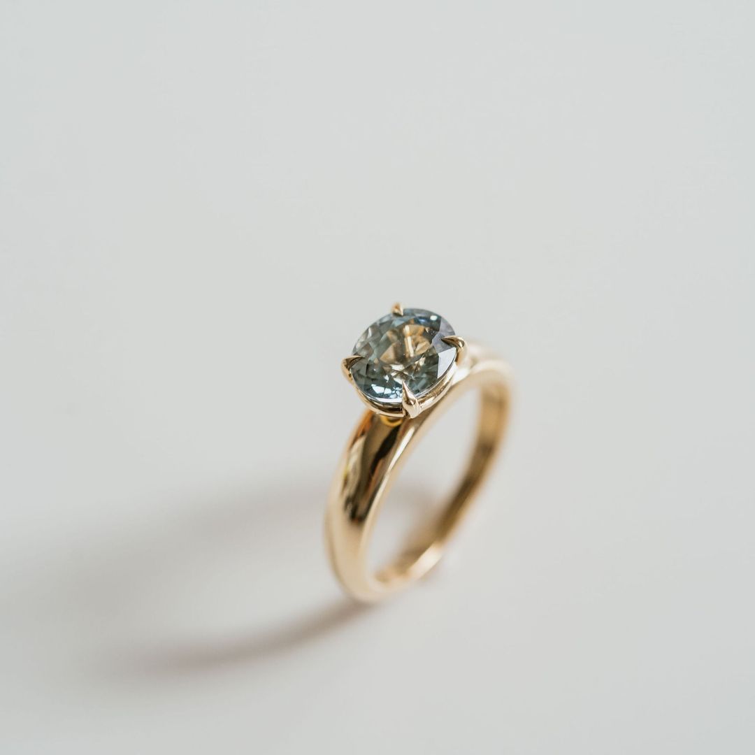 Oval Teal Sapphire East-West Arc Ring