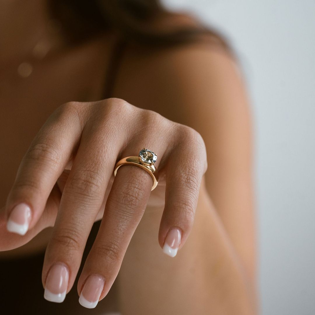 Oval Teal Sapphire East-West Arc Ring