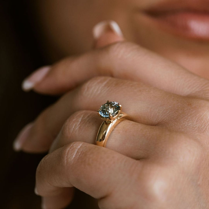 Oval Teal Sapphire East-West Arc Ring