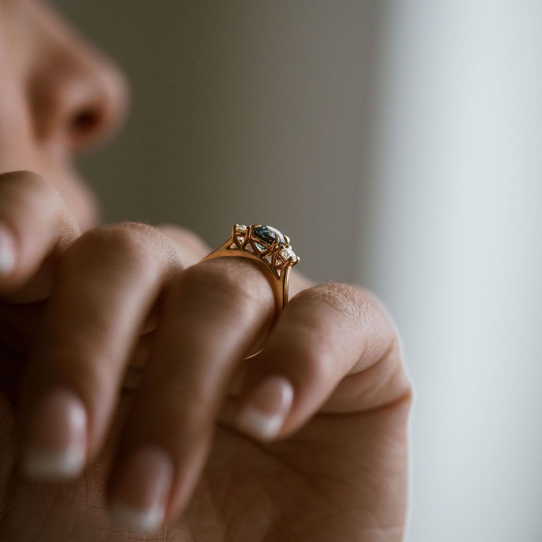 Oval Teal Sapphire With Oval Diamond Accents
