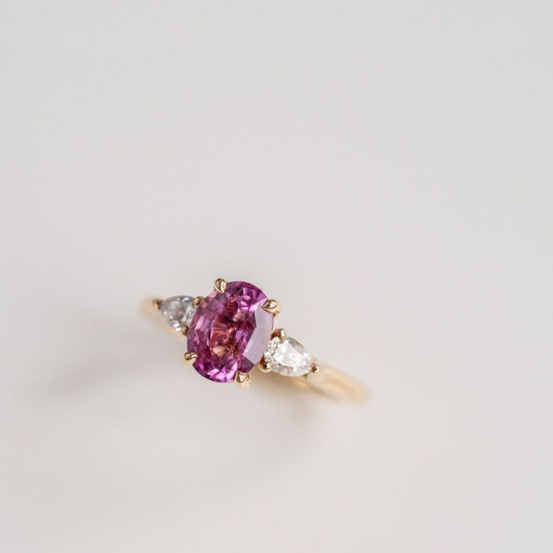 Oval Vivid Pink Sapphire With Pear Shape Diamond Accents