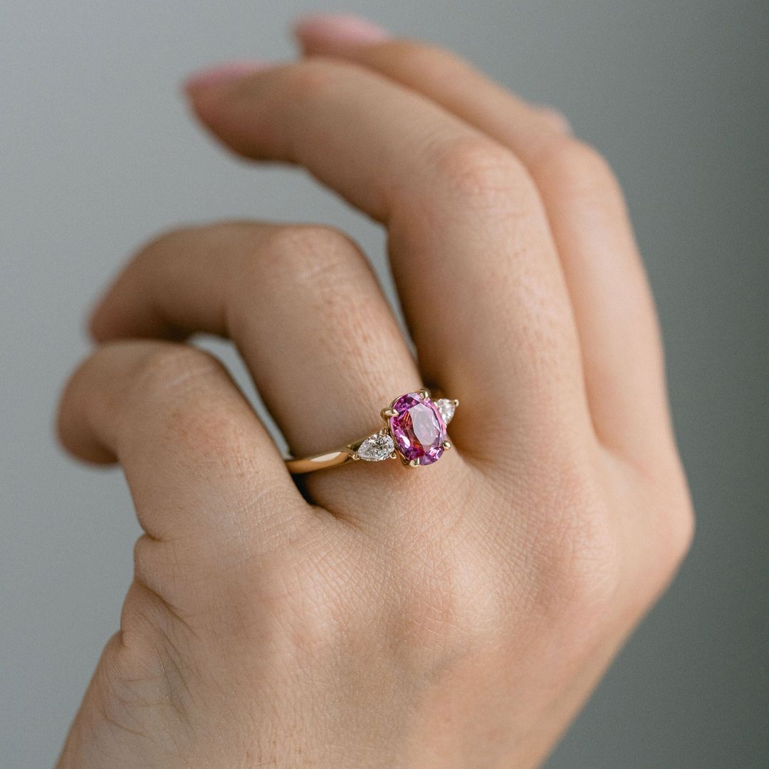 Oval Vivid Pink Sapphire With Pear Shape Diamond Accents