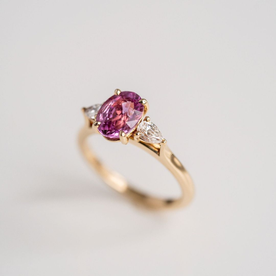 Oval Vivid Pink Sapphire With Pear Shape Diamond Accents