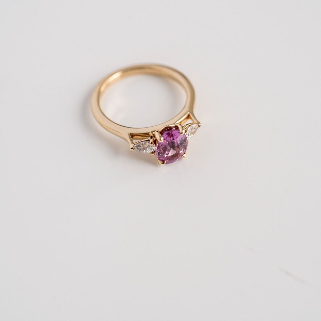 Oval Vivid Pink Sapphire With Pear Shape Diamond Accents