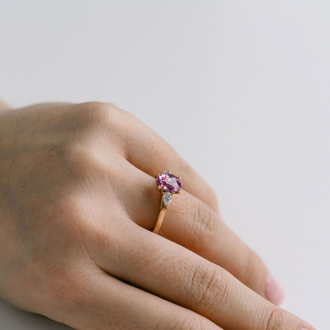 Oval Vivid Pink Sapphire With Pear Shape Diamond Accents