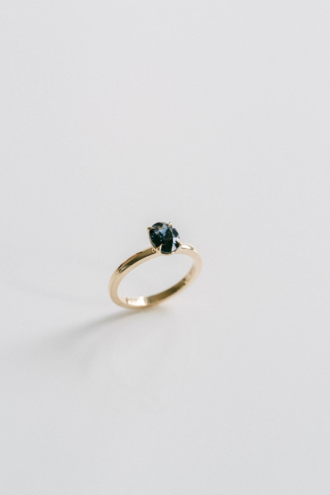 Oval Blue-Green Sapphire Cavalier Solitaire