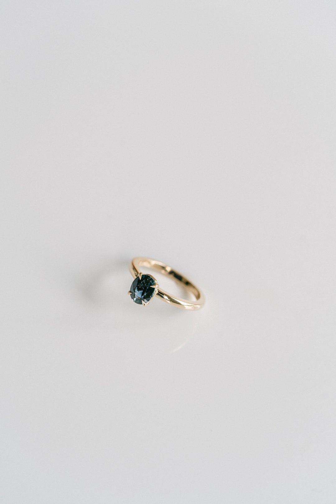 Oval Blue-Green Sapphire Cavalier Solitaire