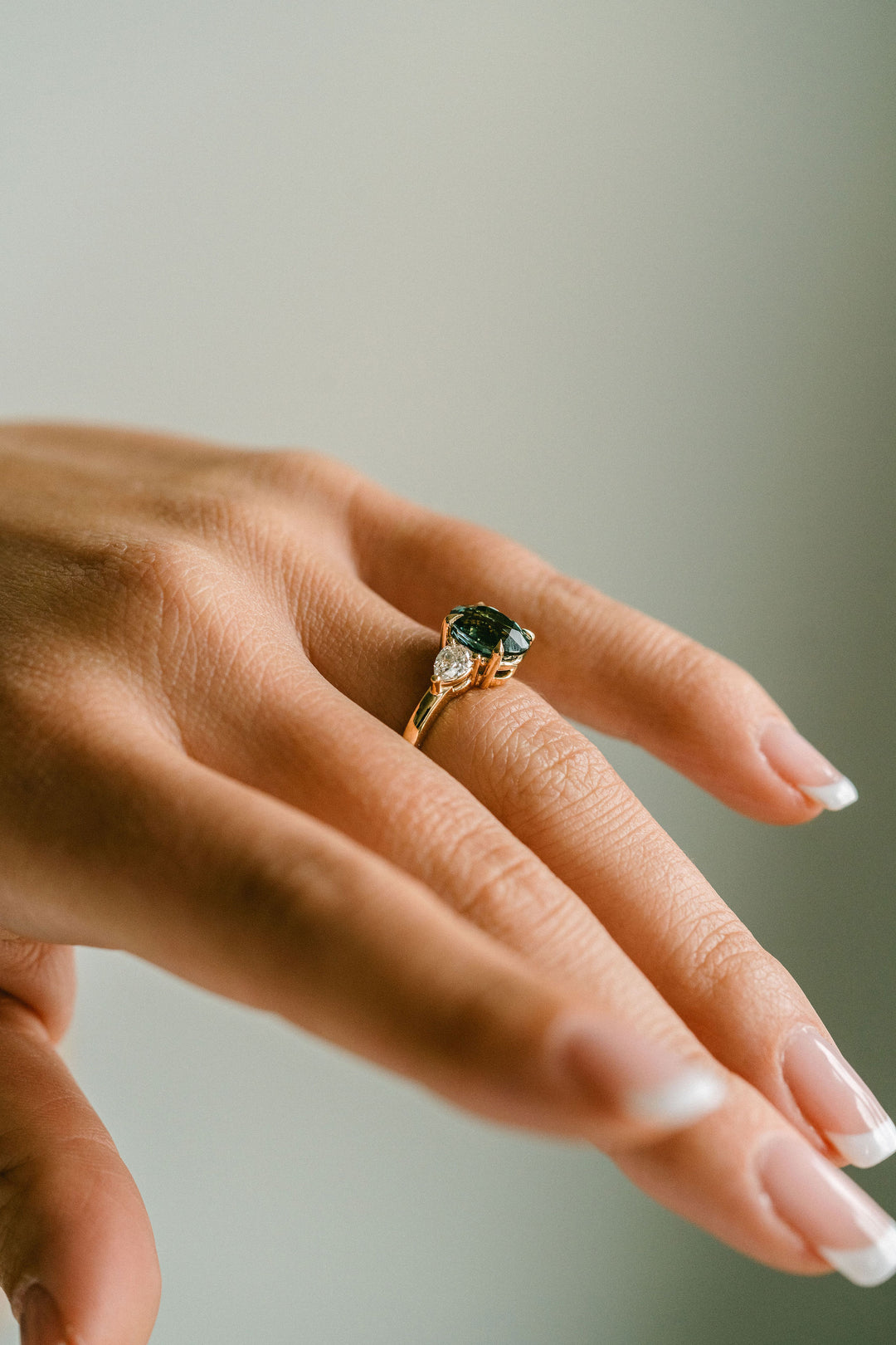 Oval Blue-Green Sapphire With Pear Shape Diamond Accents