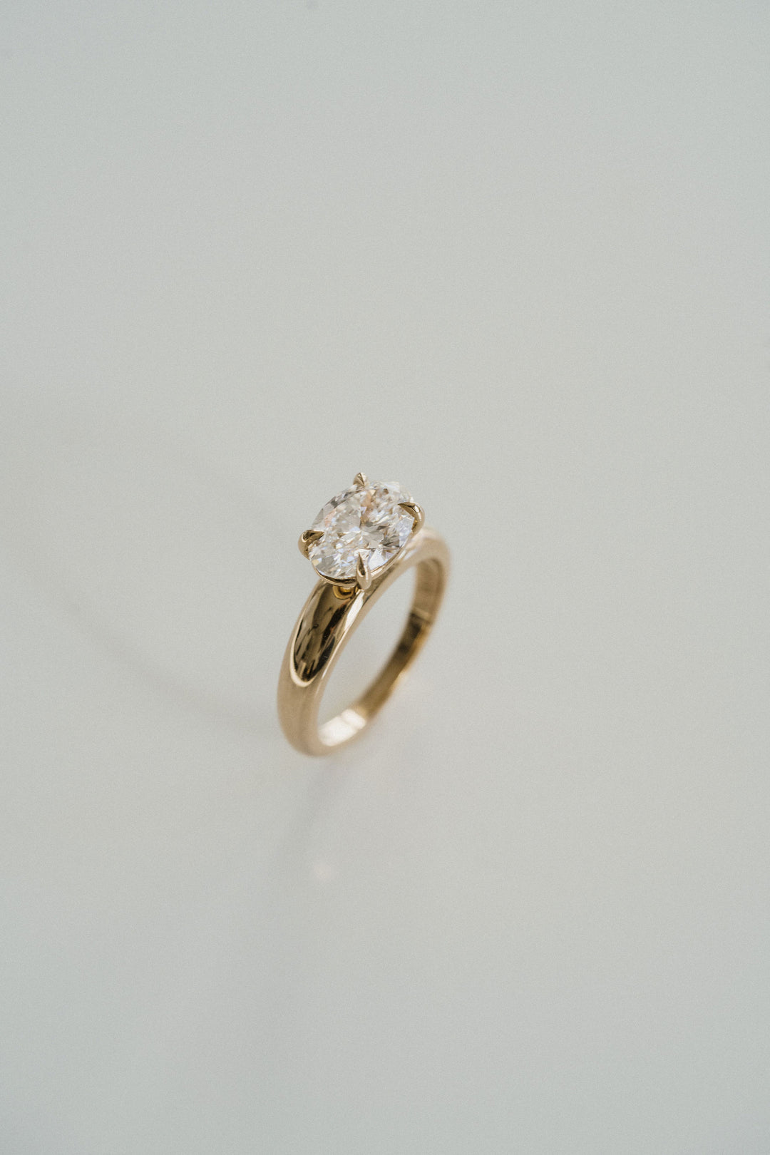 Oval Diamond East-West Arc Ring