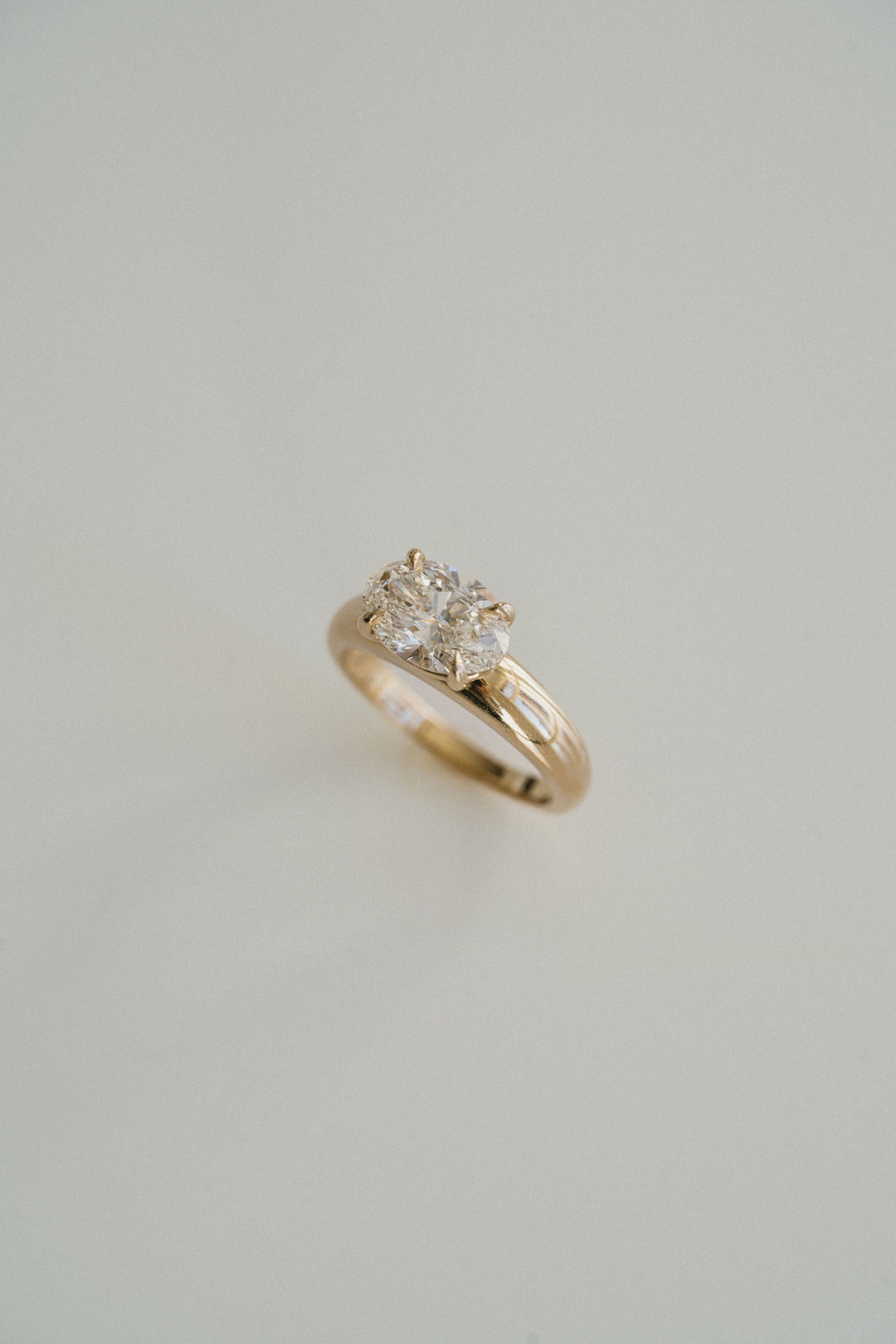 Oval Diamond East-West Arc Ring