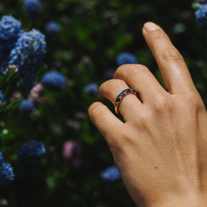 Oval East-West Blue Sapphire Dahlia Band