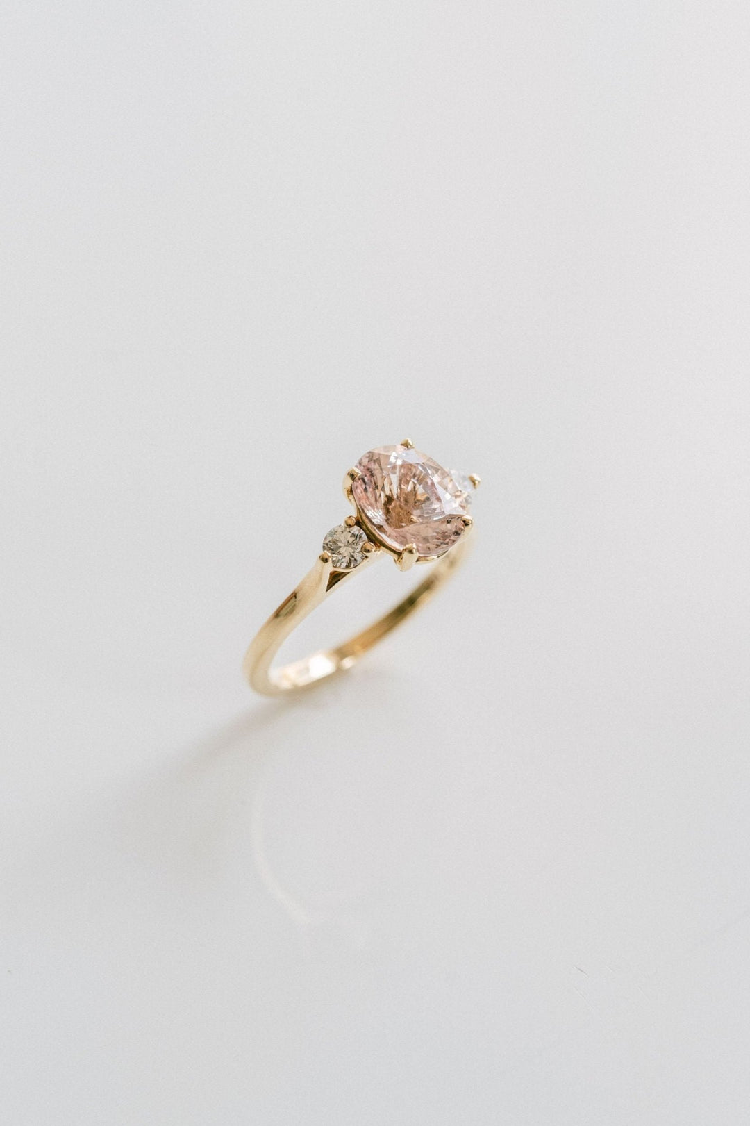 Oval Peach-Pink Sapphire With Round Diamond Accents