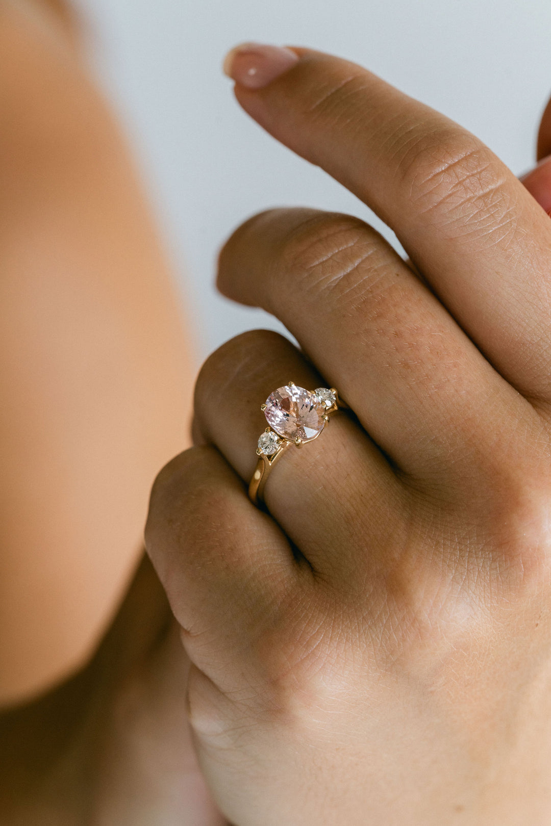 Oval Peach-Pink Sapphire With Round Diamond Accents