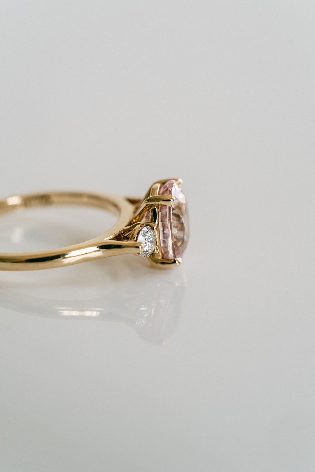 Oval Peach-Pink Sapphire With Round Diamond Accents