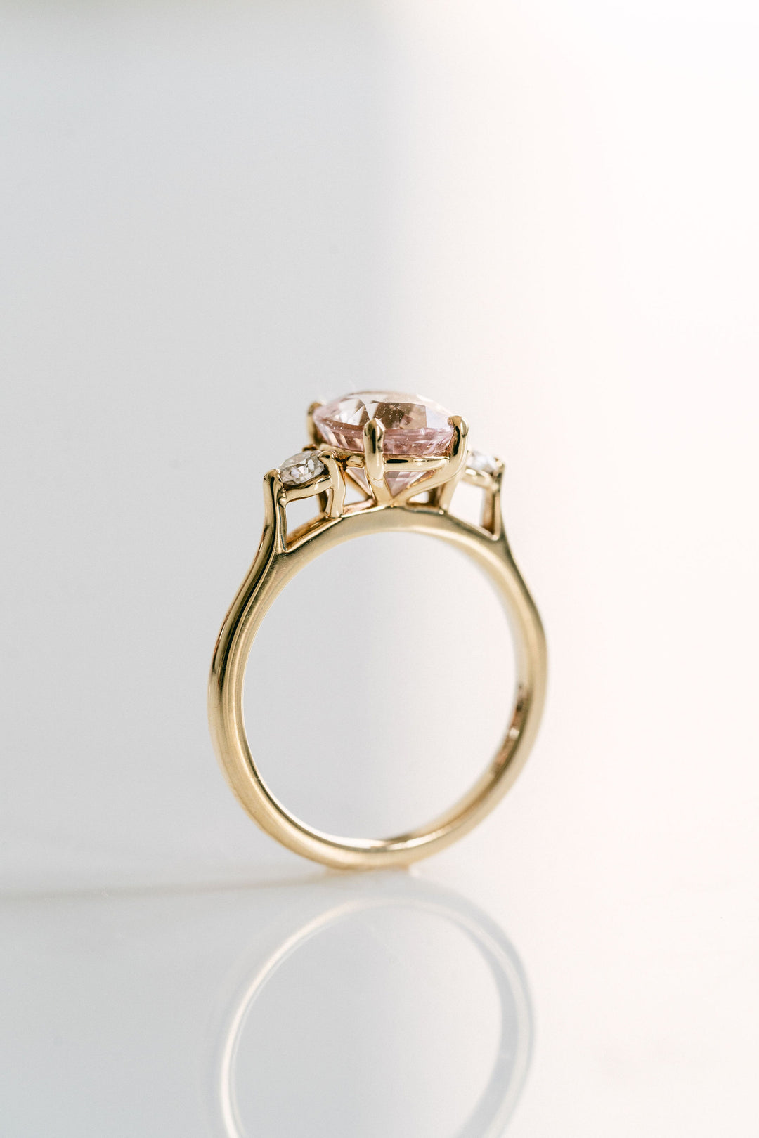 Oval Peach-Pink Sapphire With Round Diamond Accents