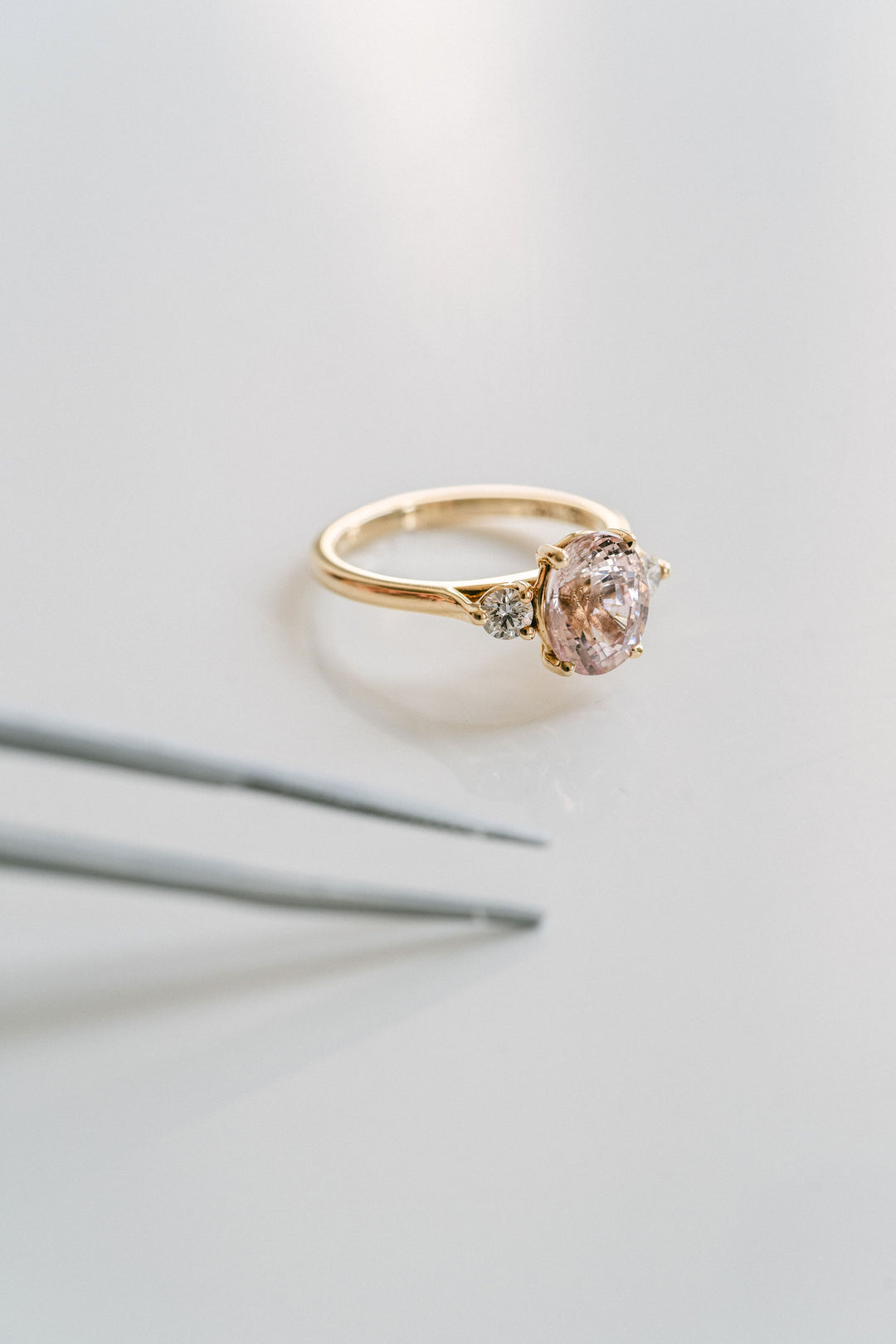 Oval Peach-Pink Sapphire With Round Diamond Accents