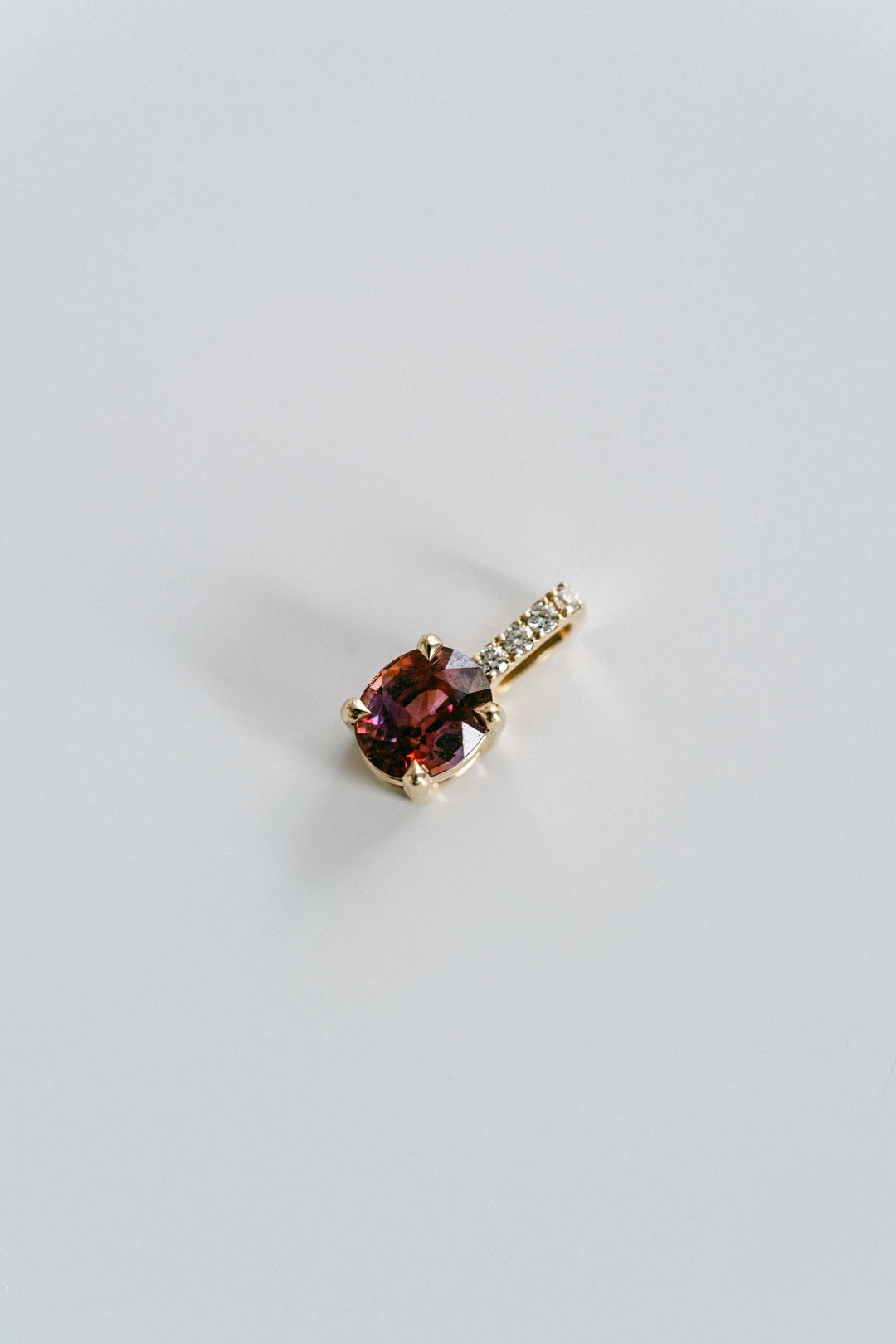 Oval Red-ish Pink Sapphire Solitaire Box Pendant With Diamond Bail