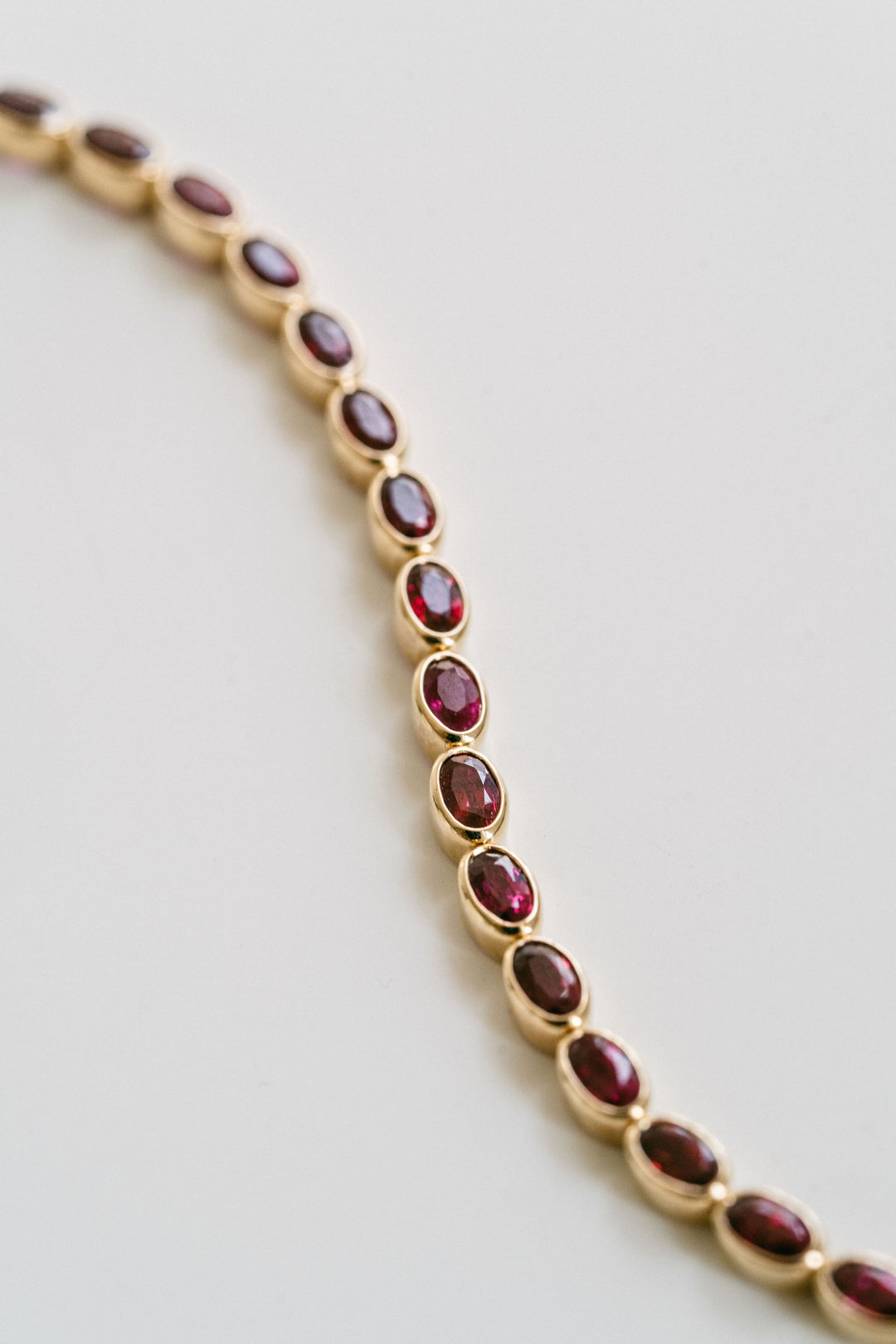 Oval Ruby Bezel Tennis Bracelet