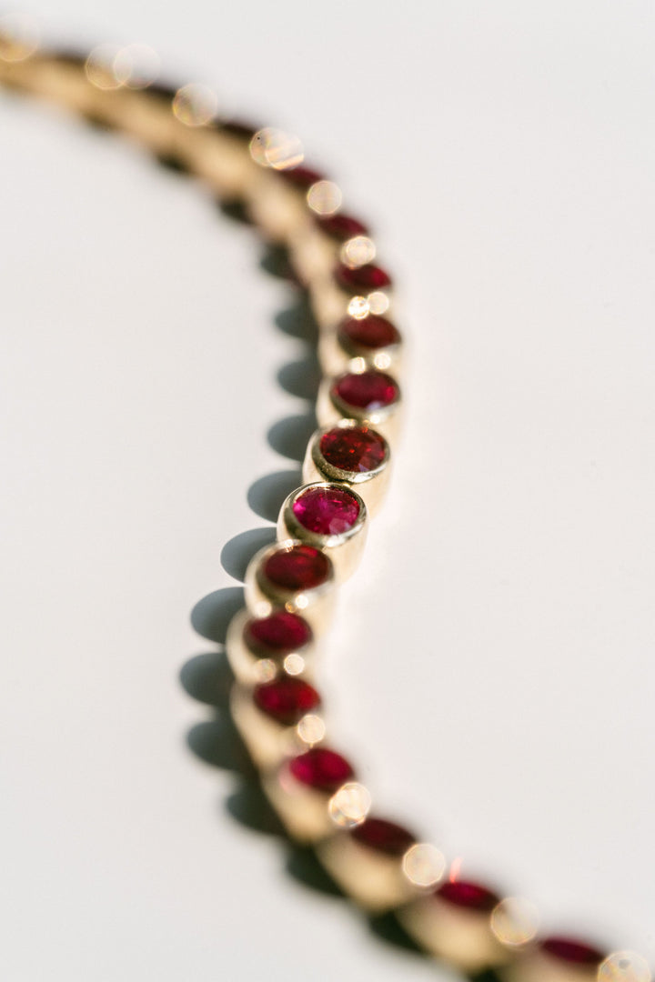 Oval Ruby Bezel Tennis Bracelet