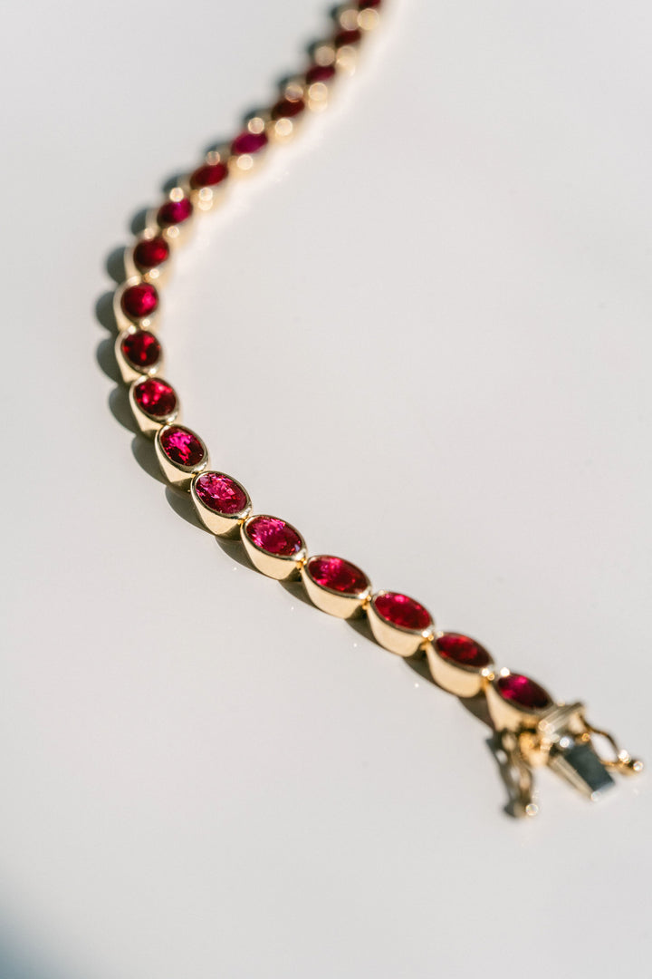 Oval Ruby Bezel Tennis Bracelet