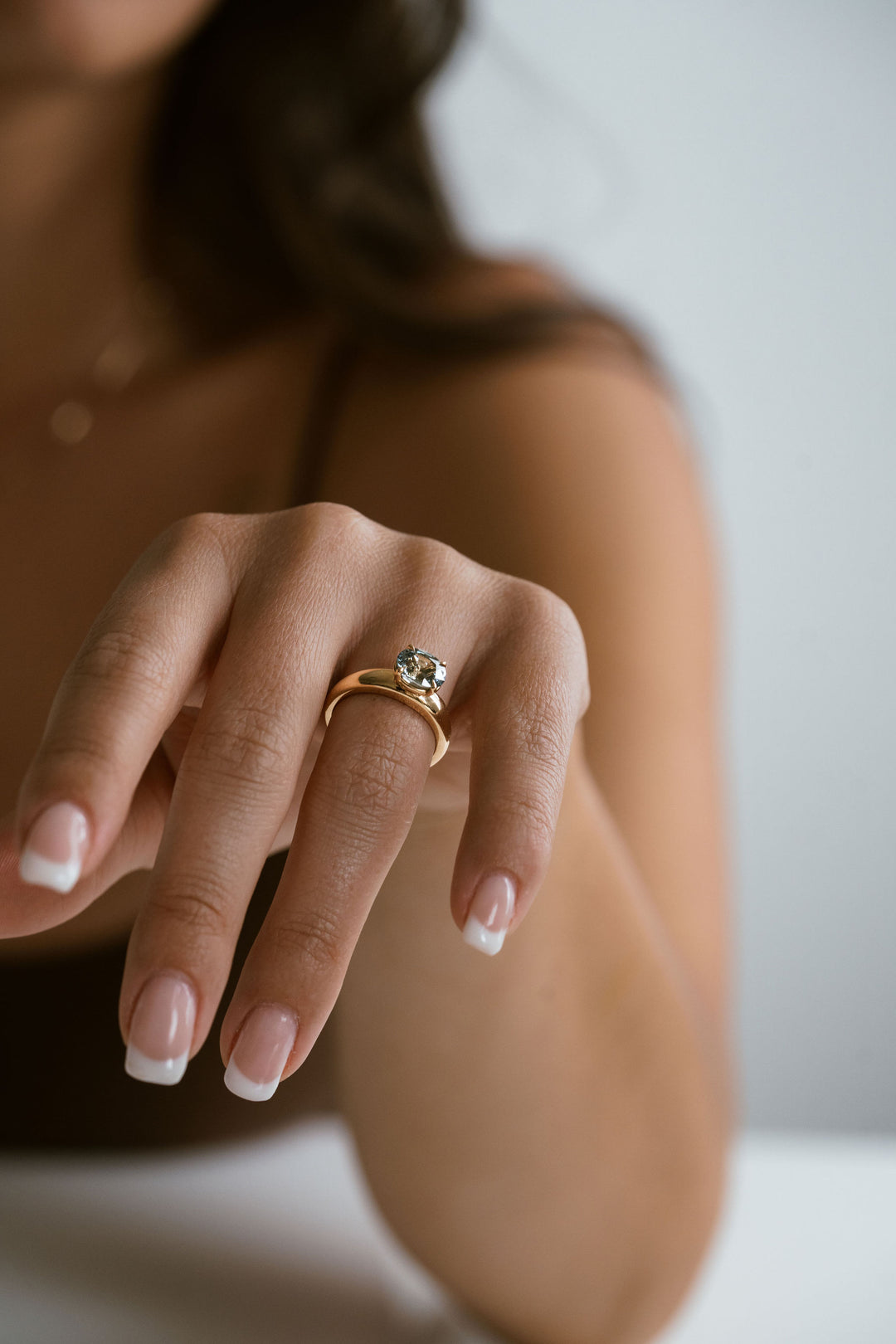Oval Teal Sapphire East-West Arc Ring